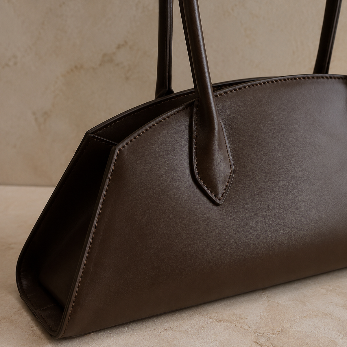 Détail d'un sac Cousue, couture et attache de poignée Image