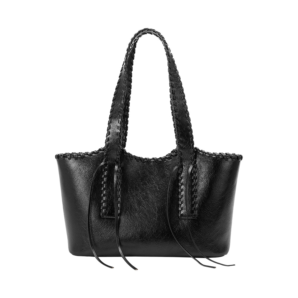 Détail des anses surpiquées du sac cabas noir Joséphine